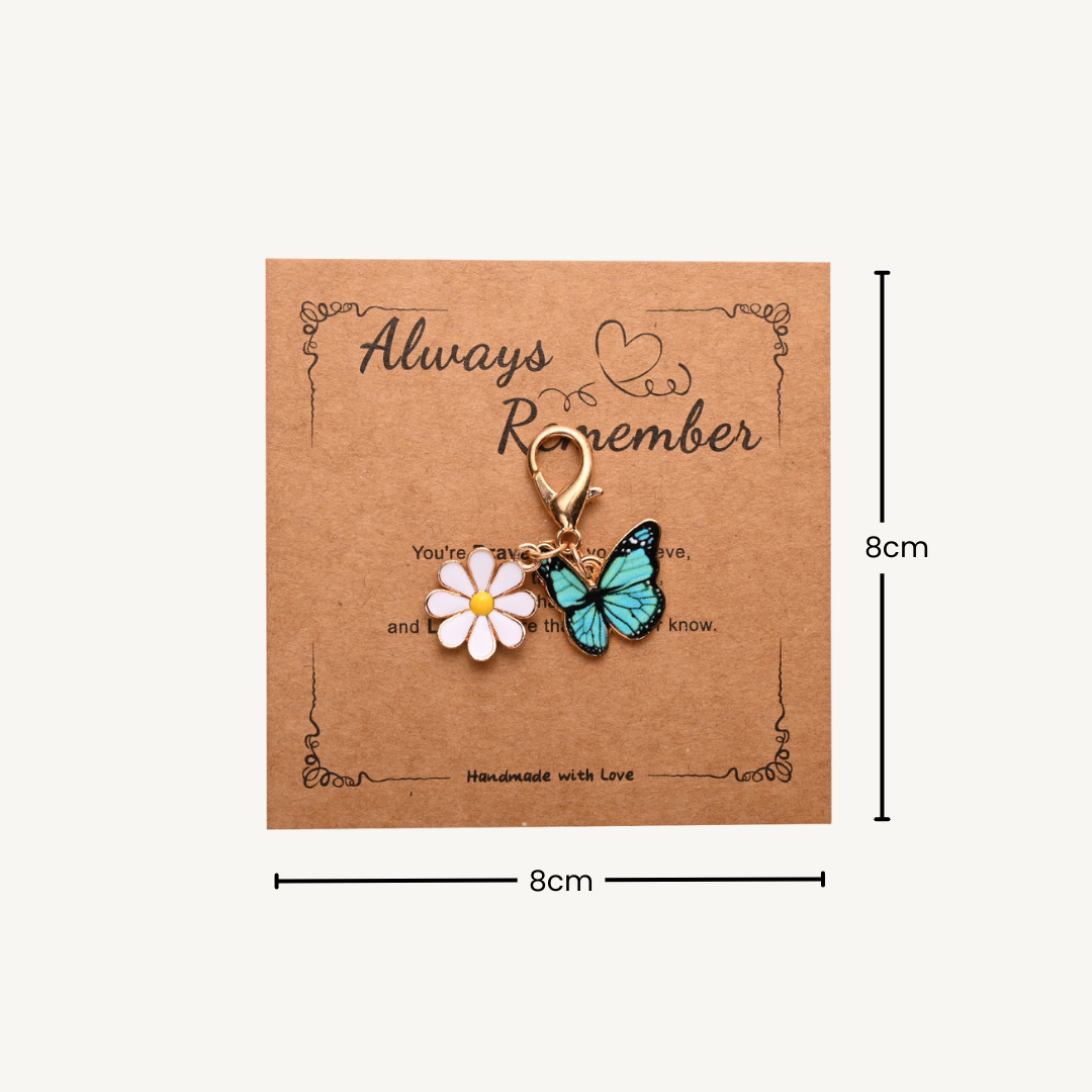 Always Remember – Schlüsselanhänger mit Schmetterling & Gänseblume